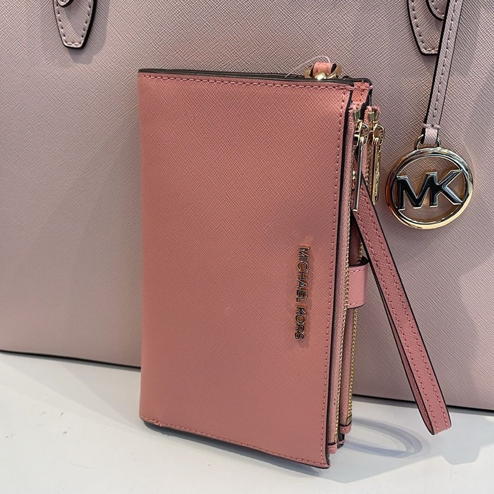 MICHAEL KORS
Jet Set Large Leather Smartphone Wristlet Wallet
Primrose 
NWT - Picture 3 of 16